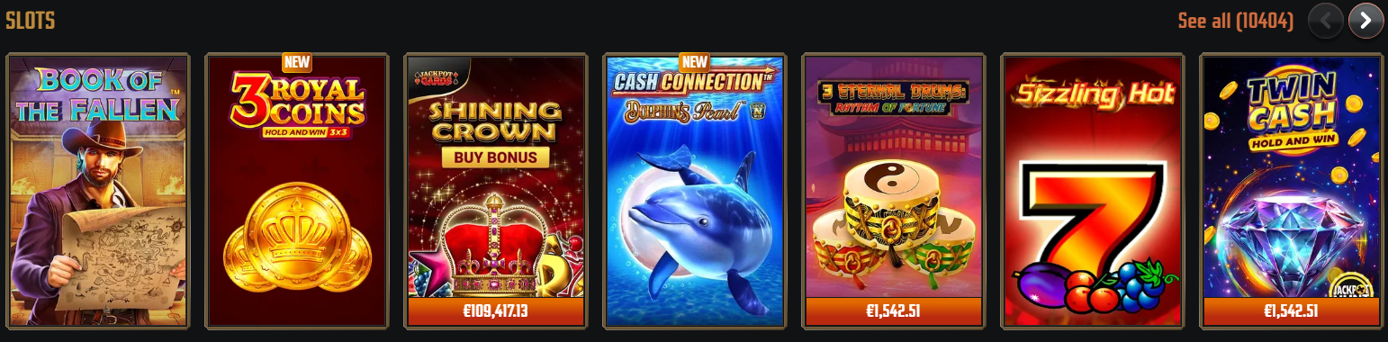 Online casino slots lobby featuring popular games like Book of the Fallen, 3 Royal Coins, Shining Crown Buy Bonus, Cash Connection Dolphin’s Pearl, Eternal Drums, Sizzling Hot, and Twin Cash with jackpot values displayed.